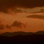 stillbilde - rex barbaricum - folkevandring - fjell og himmel i solnedgang